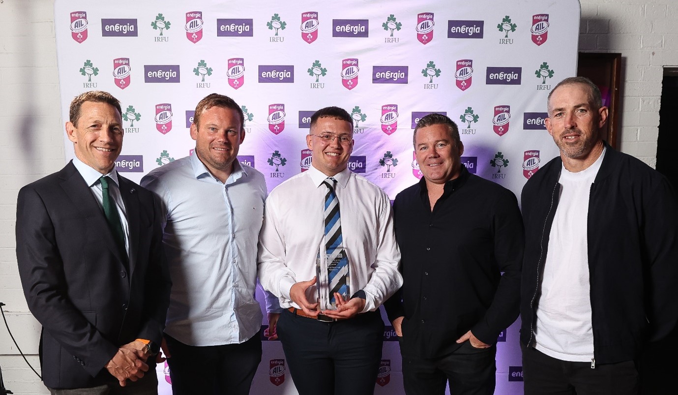 Jamie Kavanagh of Wanderers, Energia All-Ireland League Men’s Division 2B Player of the Year 2024/25 with Ireland’s Women’s Head Coach Scott Bemand, Women’s Scrum Coach Denis Fogarty, National Scrum Coach John Fogarty and Men’s Backs Coach Andrew Goodman