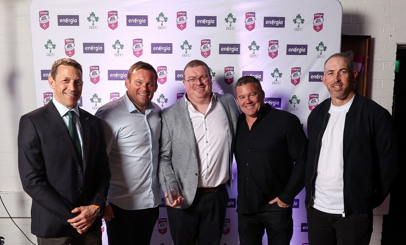 Cathal Quaid of Young Munster, Energia All-Ireland League Community Hero of the Year 2024/25, with Ireland’s Women’s Head Coach Scott Bemand, Women’s Scrum Coach Denis Fogarty, National Scrum Coach John Fogarty and Men’s Backs Coach Andrew Goodman.